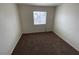 Cozy bedroom with a carpeted floor and a window at 4843 Lana Dr, Las Vegas, NV 89121
