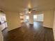 Open-concept living space showcasing dark wood floors, recessed lighting and neutral walls at 4843 Lana Dr, Las Vegas, NV 89121