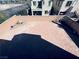 An aerial shot of a brick-paved patio surrounded by a low brick wall, offering private outdoor space at 4908 Desert Lime Ct, Las Vegas, NV 89148