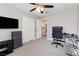 Bedroom includes modern ceiling fan, neutral wall color, and a dedicated work area at 5 Rampart Ct, Henderson, NV 89074