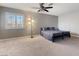 Bedroom with a basic bed frame and ample natural light at 5 Rampart Ct, Henderson, NV 89074