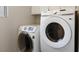 Laundry room features a newer washer and dryer at 5 Rampart Ct, Henderson, NV 89074