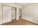An empty bedroom features neutral carpet and a closet with sliding doors at 5033 Chambliss Dr, Las Vegas, NV 89130