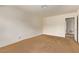 Spacious main bedroom with neutral walls and adjoining bathroom at 5033 Chambliss Dr, Las Vegas, NV 89130
