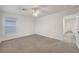 Bedroom features neutral carpet, recessed lighting and a window at 5044 Whistling Acres Ave, Las Vegas, NV 89131