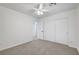 Bedroom featuring neutral carpet, recessed lighting, a window, and a closet with sliding doors at 5044 Whistling Acres Ave, Las Vegas, NV 89131