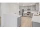 Modern kitchen with gray cabinets, stainless steel appliances, and quartz countertops at 5044 Whistling Acres Ave, Las Vegas, NV 89131