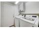 A laundry room featuring a washer and dryer at 5044 Whistling Acres Ave, Las Vegas, NV 89131