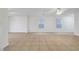 Large, bright living room with tile flooring and plenty of natural light at 5044 Whistling Acres Ave, Las Vegas, NV 89131