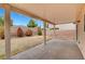 Covered patio with a view of the backyard at 5044 Whistling Acres Ave, Las Vegas, NV 89131