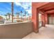 The building has a private balcony overlooking palm trees and community views at 51 E Agate Ave # 205, Las Vegas, NV 89123