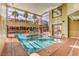 Indoor pool area with comfortable seating, offering a resort-like experience at 51 E Agate Ave # 205, Las Vegas, NV 89123