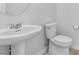 Modern bathroom featuring a pedestal sink, and sleek fixtures at 5398 Pico Viejo St, Las Vegas, NV 89166