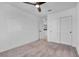 Neutral bedroom featuring a ceiling fan, carpeted floors, and a closet with sliding doors at 5398 Pico Viejo St, Las Vegas, NV 89166