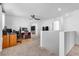 Carpeted bonus room featuring contemporary design and neutral colors at 5398 Pico Viejo St, Las Vegas, NV 89166