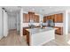 Bright, modern kitchen with stainless steel appliances and center island, creating a functional and stylish space at 5398 Pico Viejo St, Las Vegas, NV 89166