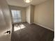 Cozy bedroom featuring a carpeted floor and a sliding-door closet at 5720 Goldmount Ave, Las Vegas, NV 89107