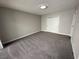 Neutral bedroom with soft carpeted floors and a closet at 5720 Goldmount Ave, Las Vegas, NV 89107