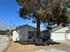 Charming single-story home featuring a well-manicured lawn and an attached two-car garage at 5720 Goldmount Ave, Las Vegas, NV 89107