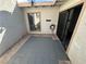 Private patio area with sliding glass door, window, and neutral tones at 5720 Goldmount Ave, Las Vegas, NV 89107