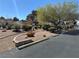 Well-manicured landscaping with mature trees adorns a quiet street at 5720 Goldmount Ave, Las Vegas, NV 89107