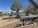 Community tennis courts with benches and picnic area at 5720 Goldmount Ave, Las Vegas, NV 89107