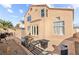 A spacious backyard with a large patio area and lush greenery, ideal for relaxing and hosting gatherings at 59 Desert Dawn Ln, Henderson, NV 89074