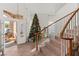 Welcoming home foyer with tiled floor and view to the front door at 59 Desert Dawn Ln, Henderson, NV 89074