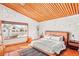 Spacious main bedroom featuring wood ceiling, textured walls, and large window at 59 Desert Dawn Ln, Henderson, NV 89074