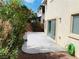 Outdoor patio with a desert landscaped yard, block wall, and easy access from the sliding door at 6245 Blushing Willow St, North Las Vegas, NV 89081