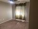 Light-filled bedroom featuring neutral walls, carpet, and lots of natural sunlight at 6245 Blushing Willow St, North Las Vegas, NV 89081