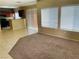 Spacious living room featuring an open floor plan, neutral tones, and great natural light at 6245 Blushing Willow St, North Las Vegas, NV 89081