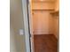 Walk-in closet with shelving and neutral carpet provides efficient storage space at 6245 Blushing Willow St, North Las Vegas, NV 89081