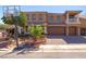 Beautiful two-story home featuring a landscaped front yard, balcony, and a two-car garage at 6403 Brandon Hills Ct, Las Vegas, NV 89139