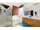 Bathroom features a dual sink vanity, tub, and shower with glass door at 6711 Quarterhorse Ln, Las Vegas, NV 89148