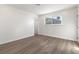 Bedroom featuring a window, vinyl flooring, and recessed lighting at 704 Slayton Dr, Las Vegas, NV 89107