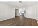 Open living room provides view to updated kitchen with stainless steel appliances at 704 Slayton Dr, Las Vegas, NV 89107