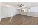 Living room features modern ceiling fan, windows and neutral colors at 704 Slayton Dr, Las Vegas, NV 89107