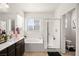 Bright bathroom featuring a separate shower and soaking tub, creating a spa-like experience at 744 Forest Peak St, Henderson, NV 89011