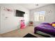 Bedroom featuring cute decor, natural light, and inviting space for playtime at 744 Forest Peak St, Henderson, NV 89011