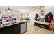 Open concept living space with kitchen, dining area and comfortable living room with backyard views at 744 Forest Peak St, Henderson, NV 89011