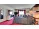 Well-lit bedroom features sleek decor and view through to ensuite at 750 S Royal Crest Cir # 345, Las Vegas, NV 89169