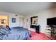 Relaxing bedroom featuring sleek black and white furniture set and a TV at 750 S Royal Crest Cir # 345, Las Vegas, NV 89169