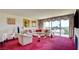 Cozy living room with balcony access, neutral furniture, and ample natural light at 750 S Royal Crest Cir # 345, Las Vegas, NV 89169
