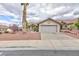 Well maintained single story home with mature landscaping, neutral colors and two car garage at 802 Blue Springs Dr, Henderson, NV 89002