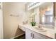 Well-lit bathroom featuring a vanity with decorative accents and lots of counter space at 8070 W Russell Rd # 2015, Las Vegas, NV 89113