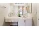 Well-lit bathroom featuring a vanity with decorative accents and lots of counter space at 8070 W Russell Rd # 2015, Las Vegas, NV 89113