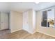 Entryway featuring a door, adjacent closet, and a window bringing in natural light at 8070 W Russell Rd # 2015, Las Vegas, NV 89113
