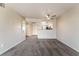 Open living room layout with new carpets, updated light fixtures, and kitchen view at 8070 W Russell Rd # 2015, Las Vegas, NV 89113
