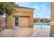 Poolside view of pool house with view of the community pool and seating at 8070 W Russell Rd # 2015, Las Vegas, NV 89113